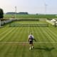 Retired farmer Mark Kuhn, who started building his grass court in 2002, spends around 12 hours a week maintaining the All Iowa Lawn Tennis Club. 
